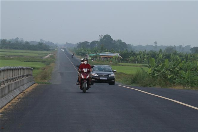 Đường tỉnh 922 (Cần Thơ) được thông xe ngày 28/1/2022. (Ảnh: Ngọc Thiện/TTXVN) Điều chỉnh quy hoạch đô thị: Phân cấp mạnh đi đôi kiểm tra chặt chẽ ảnh 2