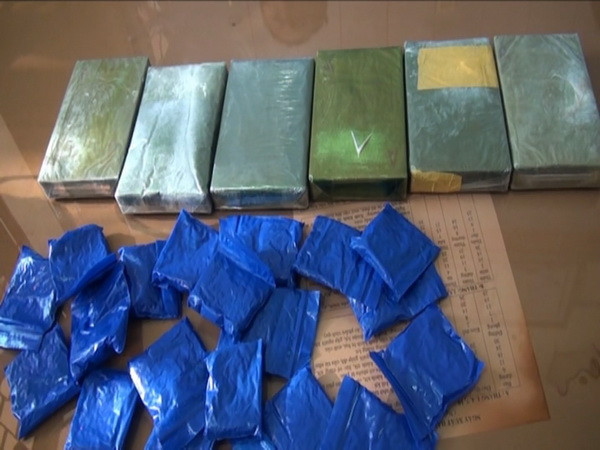 Hòa Bình: Xét xử 2 đối tượng vận chuyển 26 bánh heroin ảnh 1