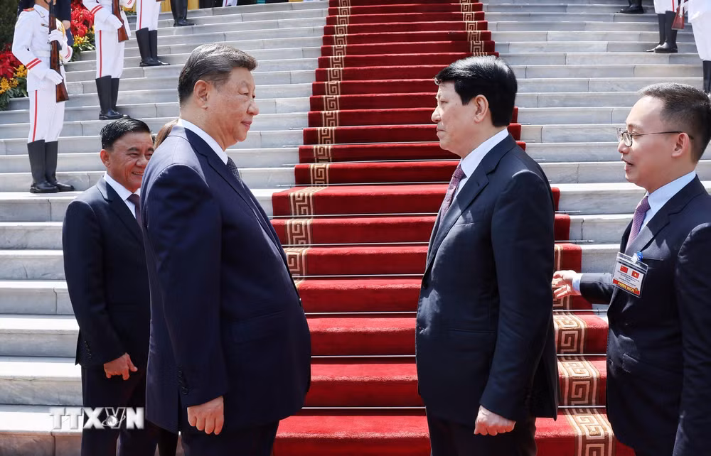 ttxvn-chu-tich-nuoc-luong-cuong-tien-tong-bi-thu-chu-tich-nuoc-trung-quoc-tap-can-binh-1504-3.jpg