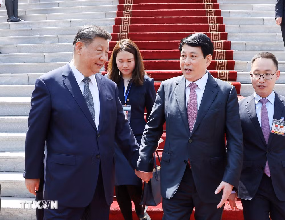 ttxvn-chu-tich-nuoc-luong-cuong-tien-tong-bi-thu-chu-tich-nuoc-trung-quoc-tap-can-binh-1504-2.jpg