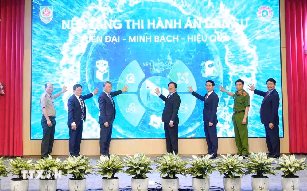 ttxvn-bo-tu-phap-khai-truong-nen-tang-so-ve-thi-hanh-an-dan-su-0304-1.jpg