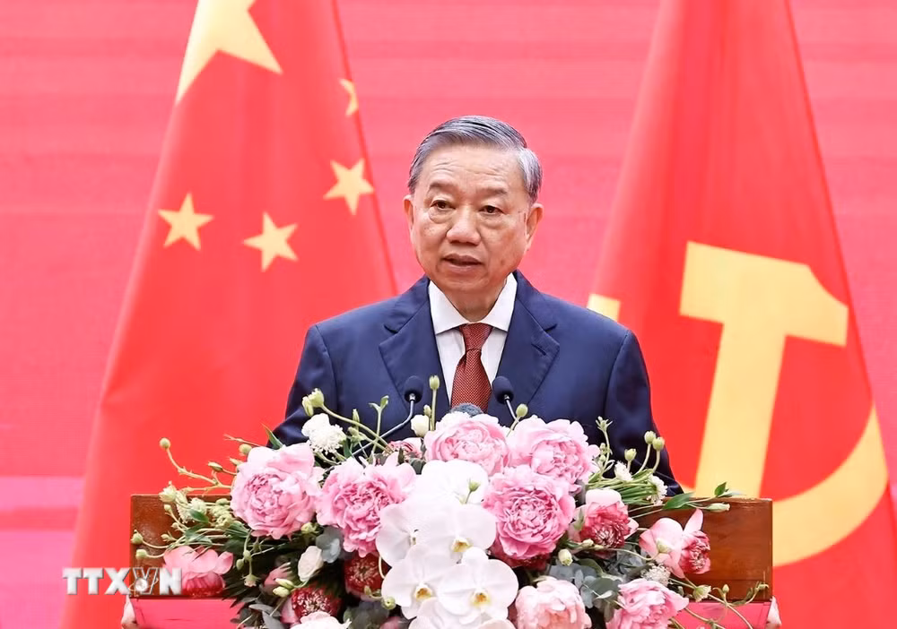 ttxvn-lanh-dao-dang-nha-nuoc-viet-nam-trung-quoc-du-lien-hoan-giao-luu-huu-nghi-nhan-dan-hai-nuoc-1504-2.jpg