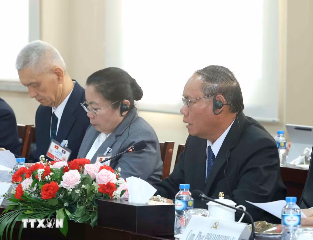 ttxvn-thuong-truc-ban-bi-thu-tran-cam-tu-hoi-dam-voi-thuong-truc-ban-bi-thu-tu-dang-ndcm-lao-0904-13.jpg