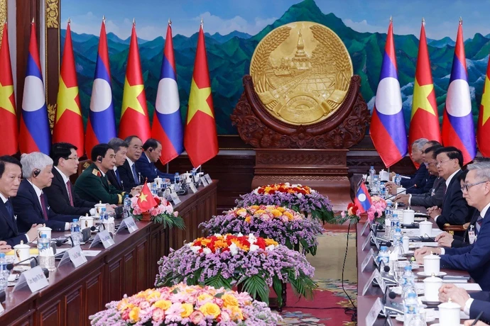 Chủ tịch nước Lương Cường hội đàm với Tổng Bí thư, Chủ tịch nước Lào Thongloun Sisoulith. (Ảnh: Lâm Khánh/TTXVN)