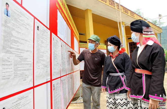 Cử tri nô nức đi bỏ phiếu, thực hiện quyền công dân thiêng liêng ảnh 1