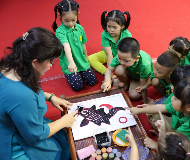 TTXVN_1111 giao vien tranh Dong ho 3.jpg