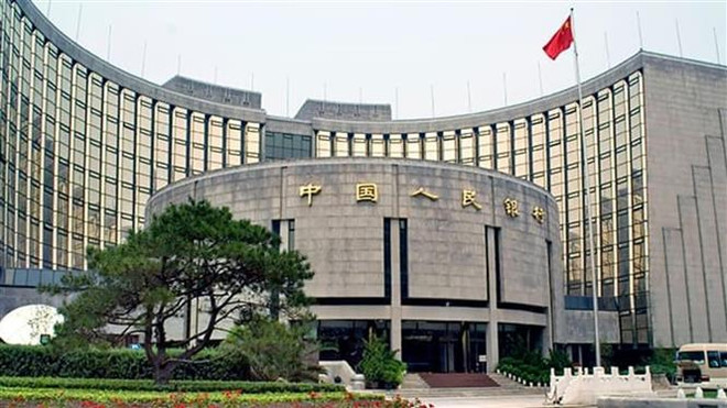 Trụ sở Ngân hàng Nhân dân Trung Quốc tại Bắc Kinh. (Ảnh: THX/TTXVN) Credit Suisse dự báo Trung Quốc sẽ giảm tỷ lệ dự trữ bắt buộc ảnh 1