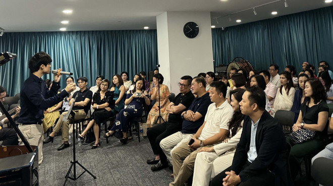 ttxvn_nguoi Viet o Singapore (3).jpg