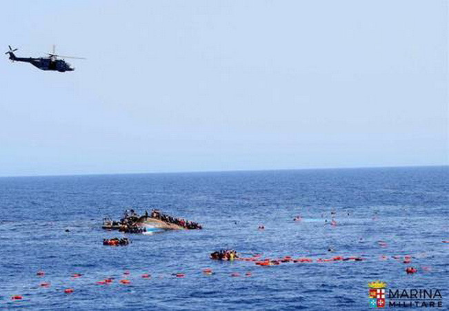 Lật thuyền chở người di cư ở Libya, hàng chục người thiệt mạng ảnh 1