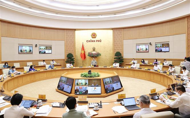 Quang cảnh cuộc họp Ban Chỉ đạo Quốc gia phòng, chống dịch COVID-19. (Ảnh: Dương Giang/TTXVN) Hà Nam, Đà Nẵng, Kiên Giang tiếp tục thực hiện nghiêm việc chống dịch ảnh 1
