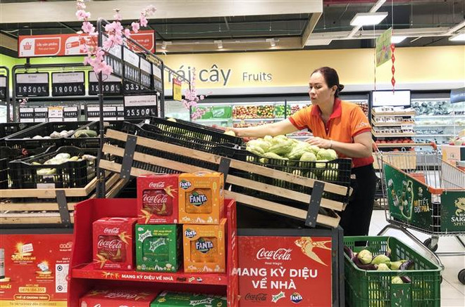 TP.HCM: Nhiều điểm bán lẻ đồng loạt mở cửa ngày mùng 2 Tết ảnh 1