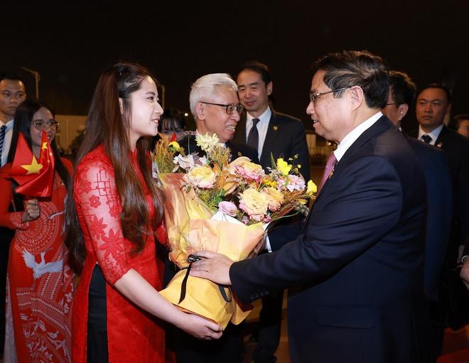 ttxvn_thu tuong p ham minh chinh den trung khanh (1).jpg