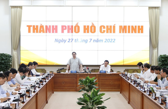 Thủ tướng Phạm Minh Chính làm việc với lãnh đạo chủ chốt Thành phố Hồ Chí Minh. (Ảnh: Dương Giang/TTXVN) Thủ tướng làm việc với lãnh đạo chủ chốt Thành phố Hồ Chí Minh ảnh 2