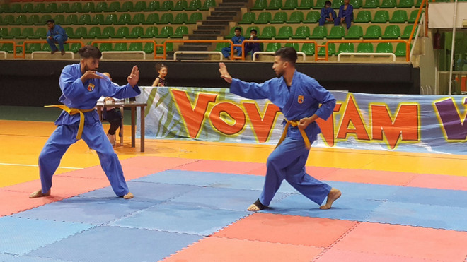 Các võ sinh thi đấu tại giải Vovinam – Việt Võ Đạo tranh cúp Đại sứ. (Ảnh: Anh Tuấn/TTXVN) Hơn 80 võ sinh từ các nước tới Ai Cập thi đấu Việt Võ Đạo ảnh 1