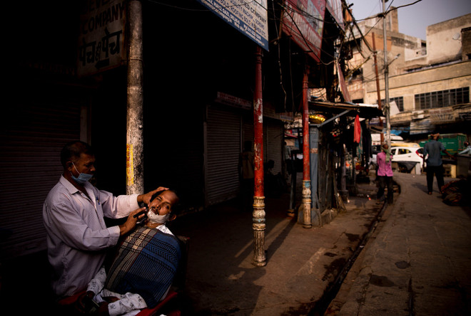 Một số thành phố lớn của Ấn Độ nối lại nhiều hoạt động dịch vụ ảnh 1