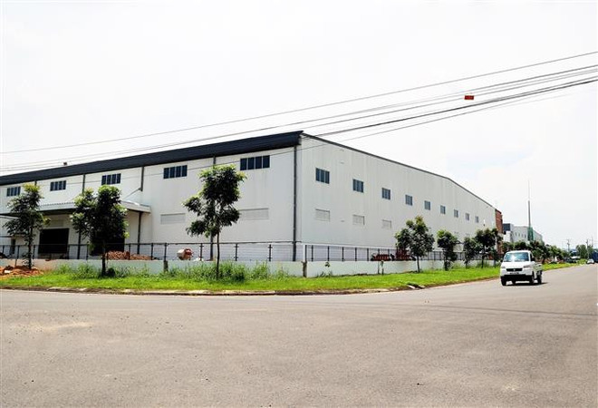 Nhà xưởng cho thuê tại khu công nghiệp Tân Đông Hiệp B, thành phố Dĩ An, tỉnh Bình Dương. (Ảnh: Hồng Đạt/TTXVN) Quy định đối tượng được gia hạn thuế, tiền thuê đất năm 2023 ảnh 1