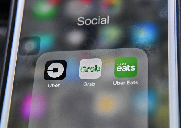 Đến lượt Philippines xem xét thương vụ sáp nhập giữa Grab và Uber ảnh 1
