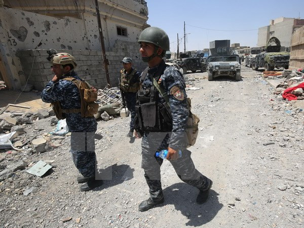Iraq thu giữ kho vũ khí hóa học của nhóm khủng bố IS tại Mosul ảnh 1