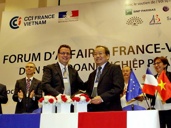 Doanh nghiệp Việt Nam-Pháp ký kết hợp tác nông nghiệp, y tế ảnh 1