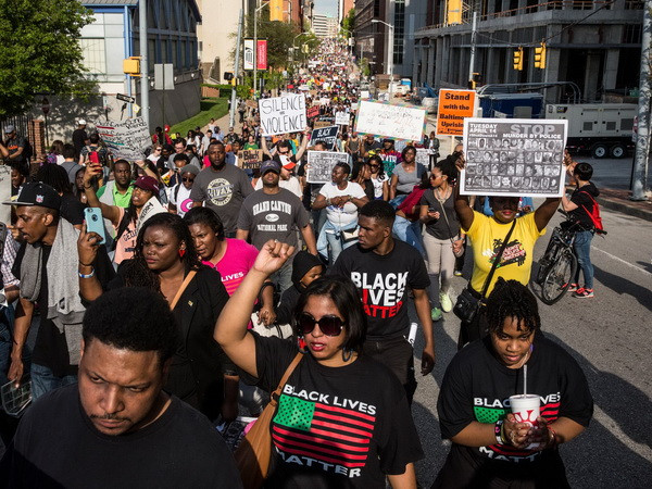 Tổng thống Mỹ Barack Obama nỗ lực giải quyết mâu thuẫn sắc tộc ảnh 1