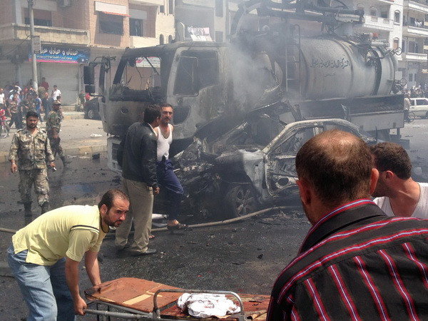 Ngoại trưởng Mỹ cam kết tăng viện trợ các nước láng giềng Syria ảnh 1