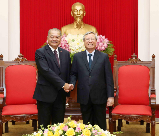 Thường trực Ban Bí thư tiếp Đoàn đại biểu Đảng Nhân dân Cách mạng Lào ảnh 1