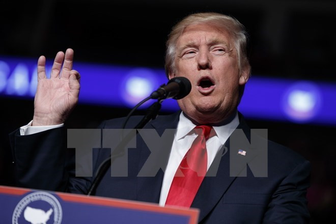 Ông Donald Trump tại một sự kiện ở Hershey (Mỹ) ngày 15/12. (Nguồn: AP/TTXVN) Nước Mỹ trải qua một năm đầy cảm xúc với sự kiện của ông Trump ảnh 1