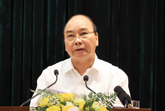 Chủ tịch nước Nguyễn Xuân Phúc. (Ảnh: Thống Nhất/TTXVN) Chủ tịch nước chủ trì họp kiện toàn Ban Chỉ đạo Cải cách Tư pháp TW ảnh 1