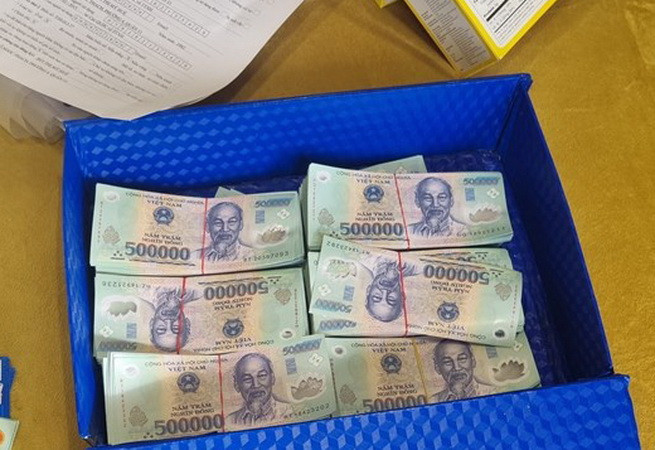 Bắt giữ 9 đối tượng sản xuất, lưu hành tiền giả và giấy tờ giả ảnh 1