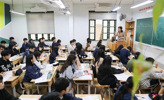 Giờ ôn tập môn Ngữ Văn của học sinh lớp 9 trường Trung học Cơ sở Thái Thịnh (quận Đống Đa, Hà Nội). (Ảnh: Thanh Tùng/TTXVN) Hà Nội công bố số lượng học sinh dự tuyển vào lớp 10 của từng trường ảnh 1