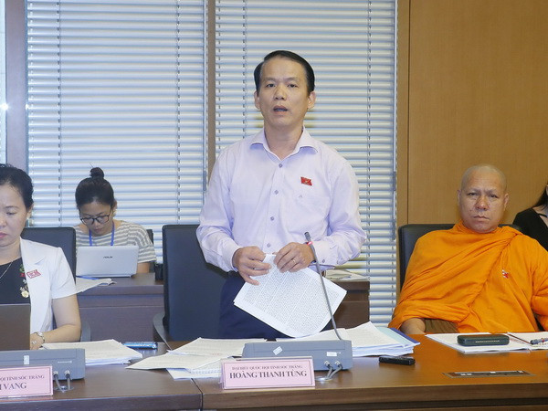 Đại biểu đưa ra nhiều ý kiến khác nhau về hình thức tố cáo ảnh 1