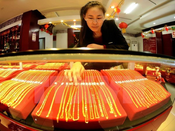 Giá vàng châu Á đi xuống trong bối cảnh đồng USD mạnh lên ảnh 1