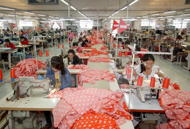 Ảnh minh họa. (Nguồn: TTXVN) VCCI: 72% số doanh nghiệp Việt Nam ủng hộ Hiệp định TPP ảnh 1