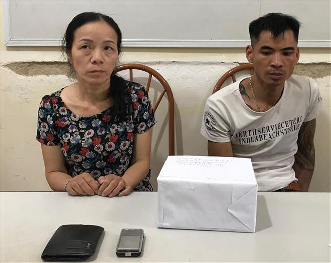 Sơn La: Bắt hai đối tượng thu 2 bánh heroin, 8.000 viên ma túy ảnh 1