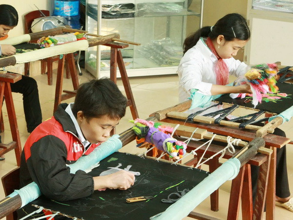 Đại tướng Ngô Xuân Lịch thăm, chúc Tết ở Làng hữu nghị Việt Nam ảnh 1