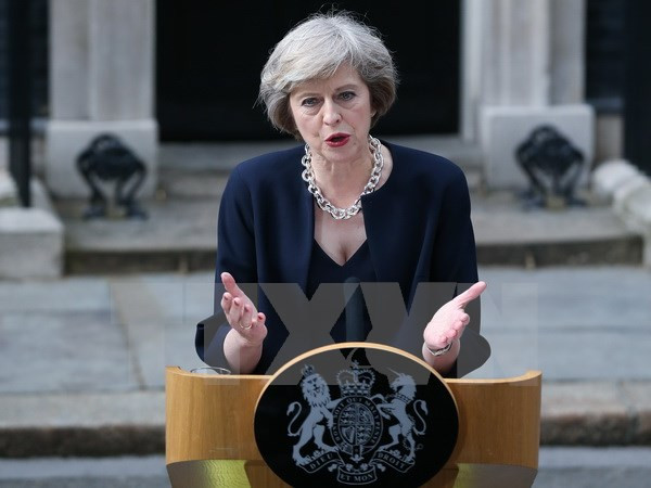 Thủ tướng Anh Theresa May trấn an giới tài phiệt Phố Wall ảnh 1