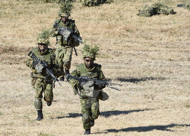 Nhật Bản để ngỏ khả năng tấn công phủ đầu căn cứ đối phương ảnh 1