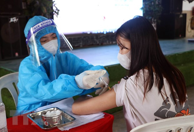 Ảnh minh họa. (Nguồn: TTXVN) Đẩy mạnh tiêm vaccine cho trẻ: Tạo lá chắn an toàn trước năm học mới ảnh 1