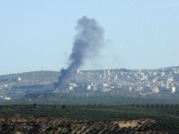 Syria: Thổ Nhĩ Kỳ đưa tay súng nước ngoài qua biên giới ảnh 1