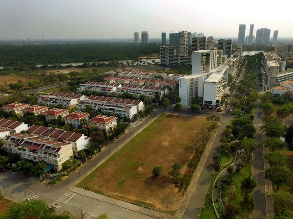 Một góc khu đô thị Phú Mỹ Hưng nhìn từ trên cao. (Ảnh: An Hiếu/TTXVN) TP.HCM: Giải pháp phát triển bền vững cho thị trường bất động sản ảnh 1