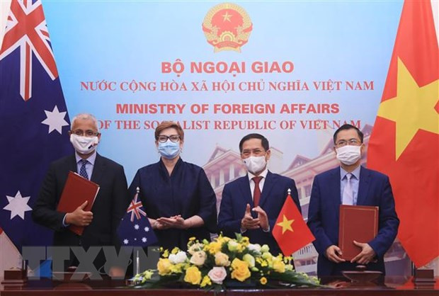 Bộ trưởng Ngoại giao Bùi Thanh Sơn và Bộ trưởng Ngoại giao Australia Marise Payne chứng kiến lễ ký biên bản ghi nhớ giữa hai bên. Ảnh minh họa. (Ảnh: Lâm Khánh/TTXVN) Đối thoại Nhân quyền Australia-Việt Nam thường niên diễn ra hiệu quả ảnh 1