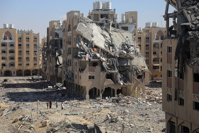 Những tòa nhà bị phá hủy sau cuộc không kích của Israel xuống Dải Gaza ngày 24/8/2024. (Ảnh: THX/TTXVN) ttxvn gaza do nat.jpg