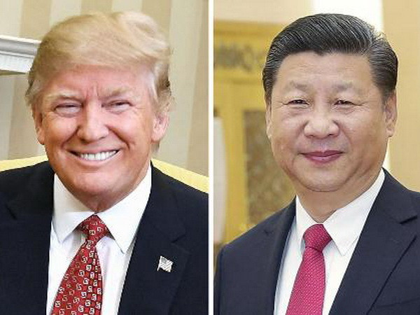 Chủ tịch Trung Quốc Tập Cận Bình (ảnh, trái) và Tổng thống Mỹ Donald Trump (ảnh, phải). (Nguồn: AFP/TTXVN) Đối thoại cấp cao về quan hệ hợp tác kinh tế Mỹ-Trung Quốc ảnh 1