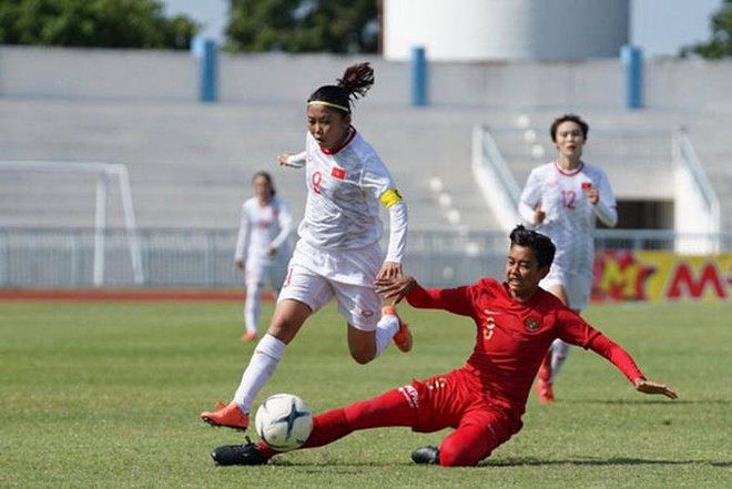 Tuyển nữ Việt Nam (áo trắng) giành ngôi nhất bảng tại AFF Cup 2019. (Nguồn: VFF) Thắng đậm Myanmar, tuyển nữ Việt Nam vào bán kết với ngôi nhất bảng ảnh 1