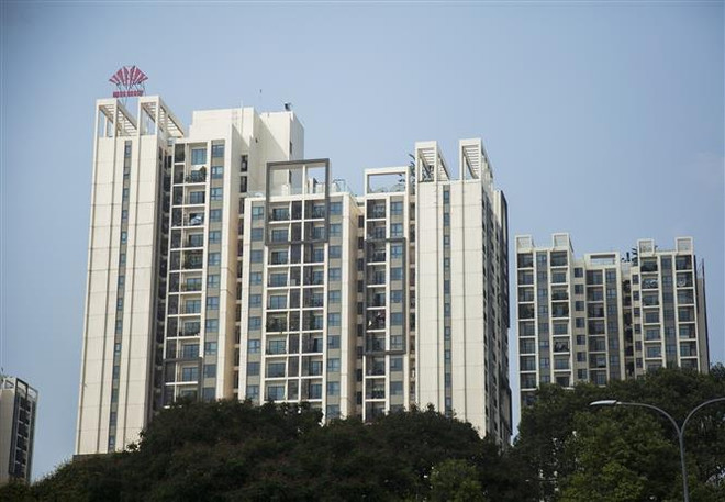 Một khu chung cư trên đường Ba Tháng Hai, quận 10, Thành phố Hồ Chí Minh. (Ảnh: Hồng Đạt/TTXVN) Bộ Xây dựng đề nghị bỏ quy định về thời hạn sở hữu nhà chung cư ảnh 1