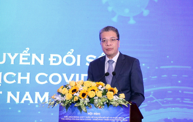 Ông Đặng Minh Khôi, Thứ trưởng Bộ Ngoại giao, Chủ nhiệm Ủy ban Nhà nước về người Việt Nam ở nước ngoài phát biểu khai mạc Hội nghị. (Ảnh: Xuân Khu/TTXVN) Chuyển đổi số và khắc phục tác động của COVID-19 để phát triển kinh tế ảnh 1