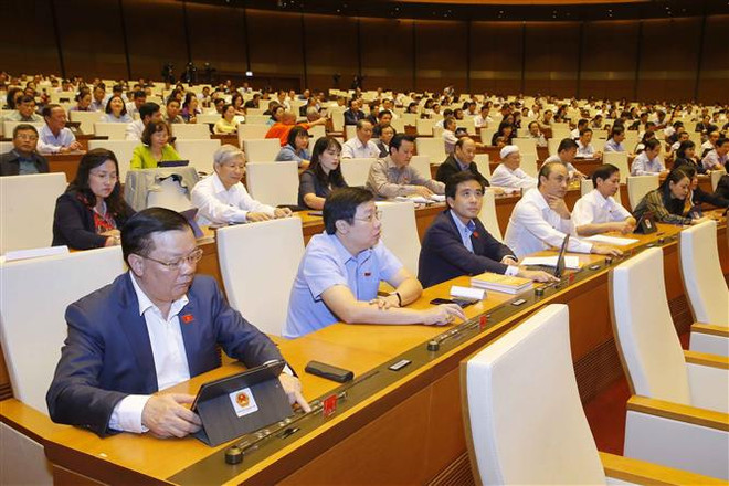 Thông qua Luật về lao động Việt Nam đi làm việc ở nước ngoài ảnh 1