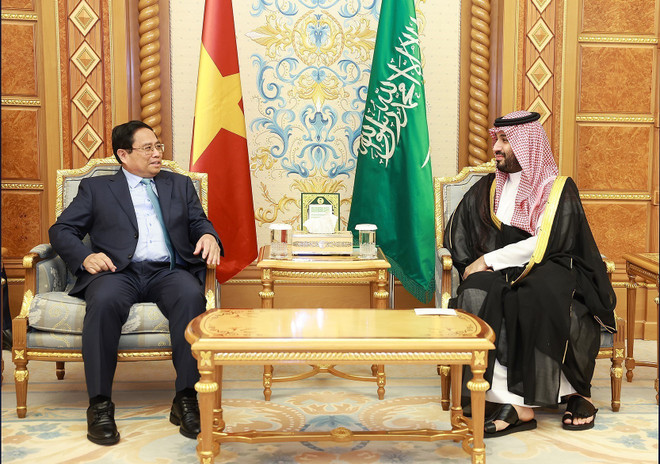 Thủ tướng Phạm Minh Chính gặp Hoàng Thái tử kiêm Thủ tướng Vương quốc Saudi Arabia Mohammed Bin Salman. (Ảnh: Dương Giang/TTXVN) ttxvn_thu tuong pham minh chinh Mohammed Bin Salman (2).jpg
