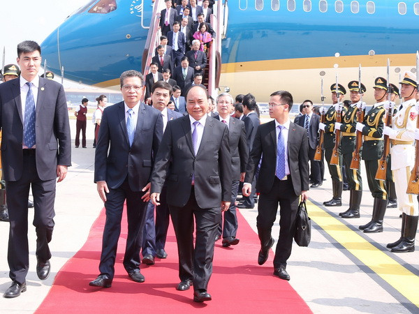 Thủ tướng Nguyễn Xuân Phúc bắt đầu thăm chính thức Trung Quốc ảnh 1
