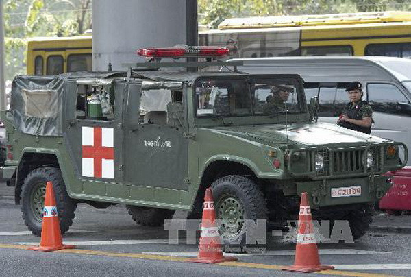 Binh sỹ Thái Lan gác ở Bangkok,. (Nguồn: AFP/TTXVN) Thái Lan thông báo các khu vực hạn chế đi lại đầu tiên ảnh 1